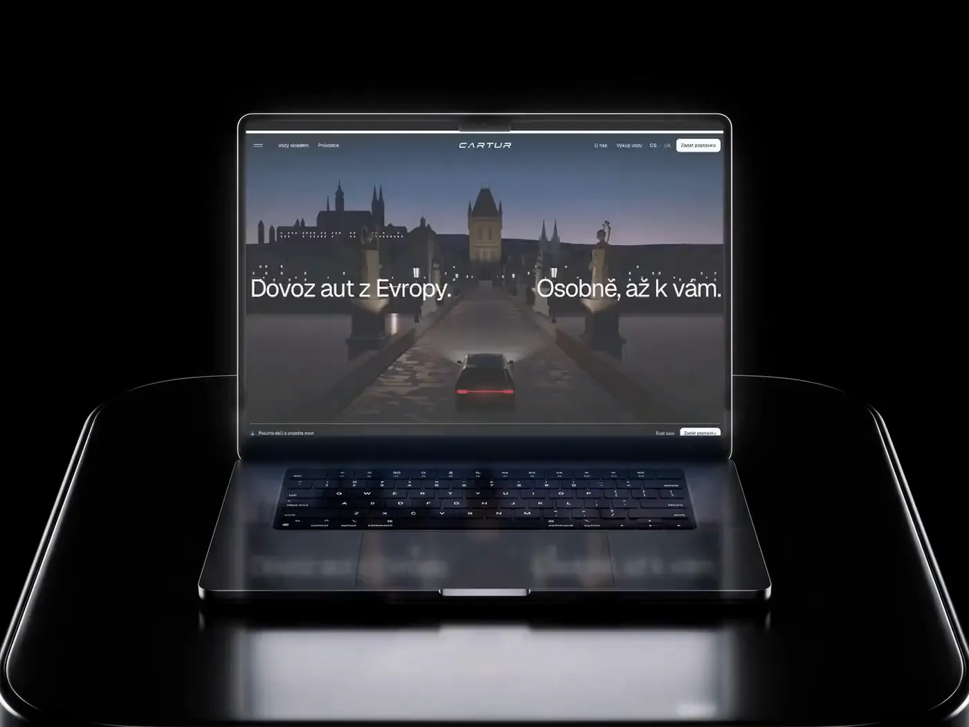 The whole page scrolled once on a laptop on black lacquer