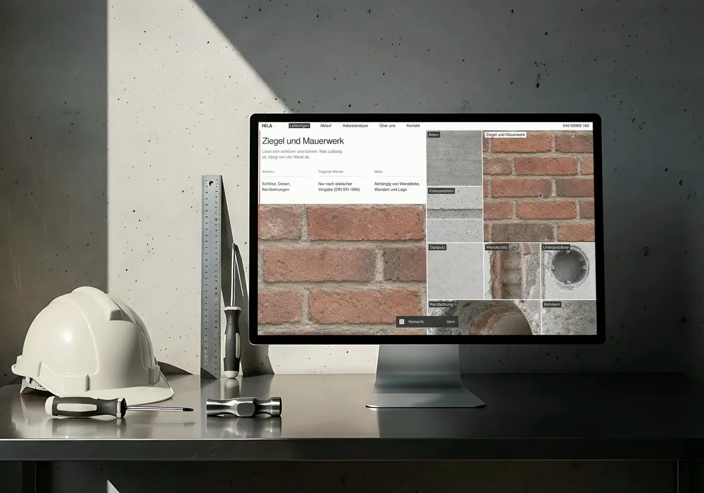 Werkstoffe on a monitor on a site desk, three tiles opening
